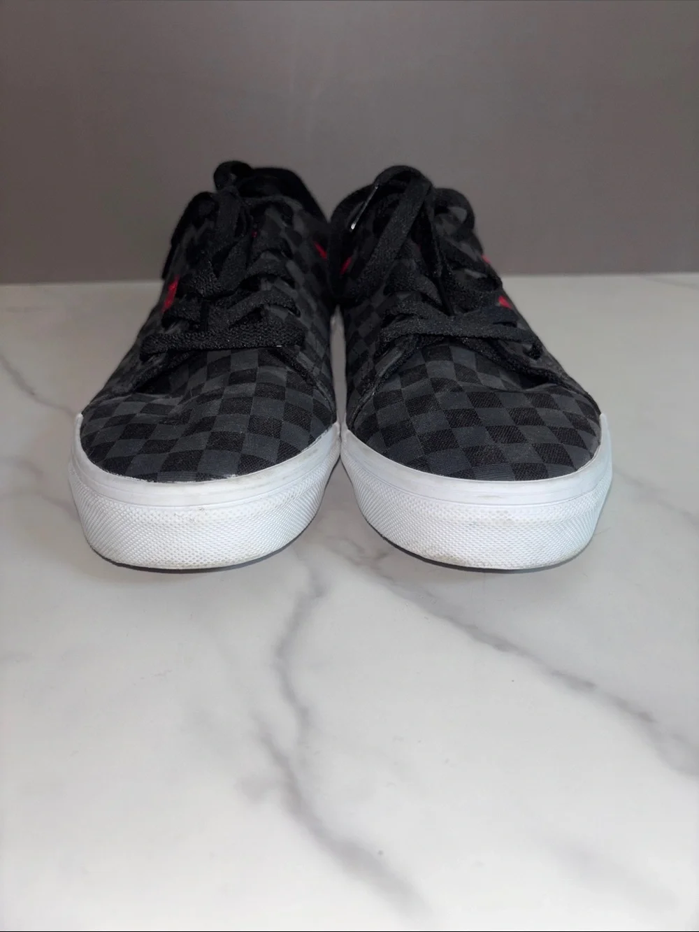 Vans Kids Checkerboard Low Top Sneakers in Black and Red